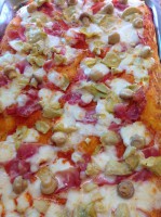Teglia di Pizza Prosciutto, funghi e carciofi